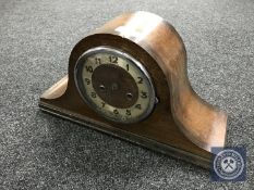 An oak cased mantel clock with key