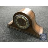 An oak cased mantel clock with key