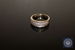 A 9ct gold diamond set band ring,