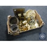 A box of assorted metal ware including brass Corinthian column candlesticks, horse brasses,