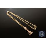 A 9ct gold tassel pendant on twist chain with magnetic clasp CONDITION REPORT: This