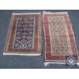 Two antique Afghan rugs