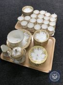 Two trays of fifty-seven pieces of Jackson & Gosling Grosvenor cream and gilt tea china