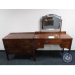 An early twentieth century mahogany dressing table with matching three drawer chest