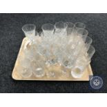 A tray of assorted lead crystal drinking glasses