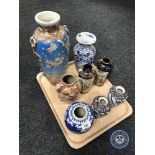 A tray of Japanese Kutani vase, blue and white ginger jar,