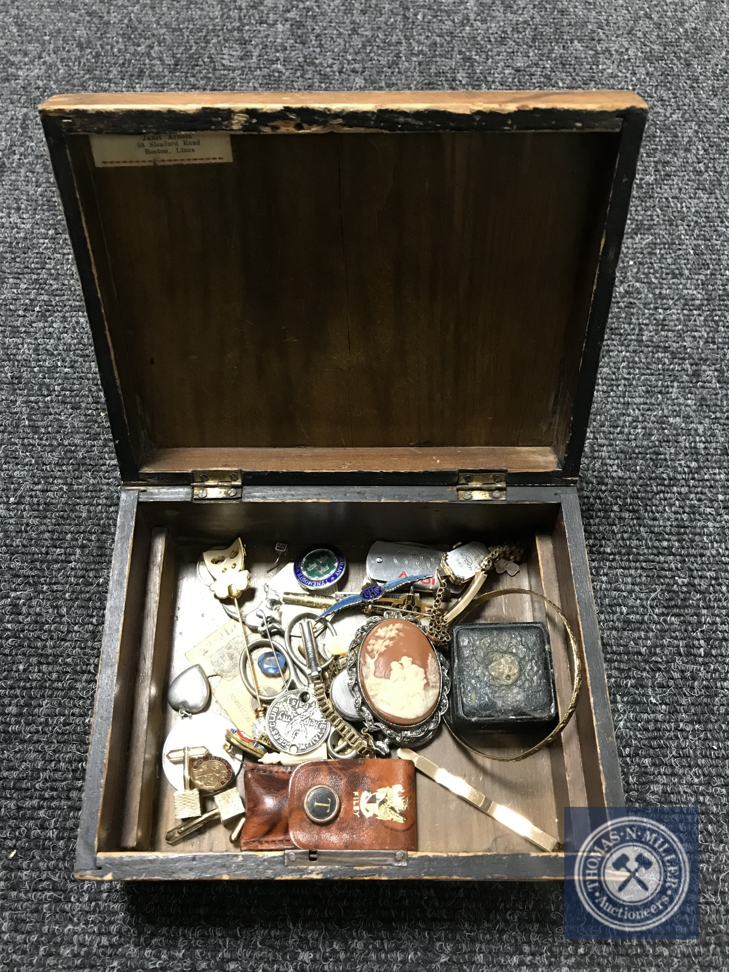 An inlaid box containing a small quantity of silver and costume jewellery,