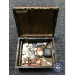 An inlaid box containing a small quantity of silver and costume jewellery,