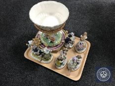 A tray containing five continental china figures together with a Portuguese china comport and a