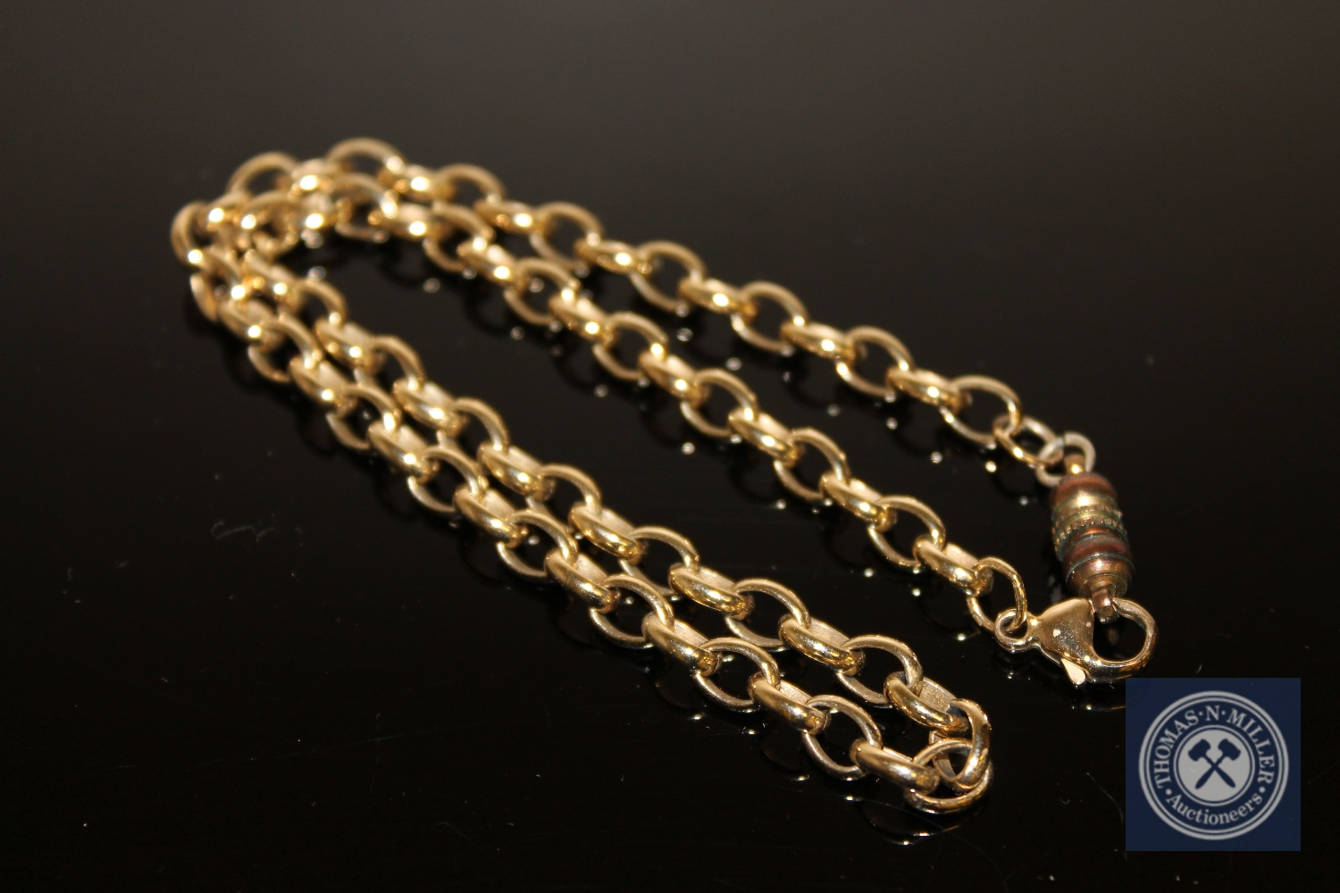 A 9ct gold chain-link necklace with magnetic clasp CONDITION REPORT: Approx. 22.