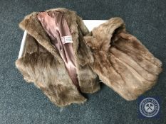 A box of four fur coats