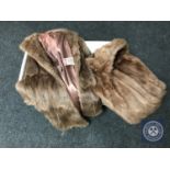 A box of four fur coats