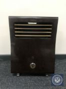 An early 20th century E.K. Cole Limited Thermovent space heater in Bakelite case.