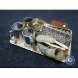 A tray of pewter tankards, brass wall plaque, bone dressing table set, tapestry purses,