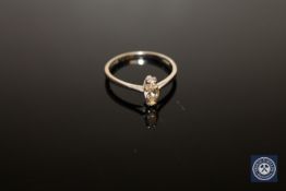 An 18ct white gold diamond solitaire ring,