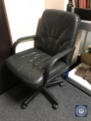 A swivel office armchair