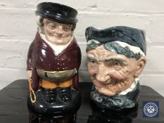 Two Royal Doulton character jugs : Granny, height 16 cm, and The Huntsman, height 20 cm.