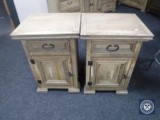 A pair of Mexican pine bedside cabinets