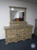 A Mexican pine mirror backed sideboard