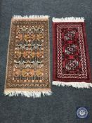 Two fringed Persian hearth rugs