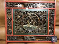A Chinese carved fretwork panel