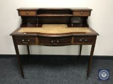 A Victorian inlaid mahogany writing desk with later correspondence shelf