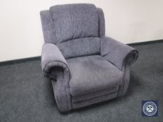 A manual reclining armchair