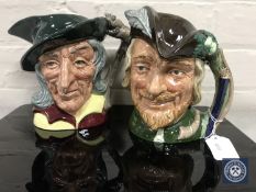 Two Royal Doulton character jugs : Robin Hood, D 6527, height 18 cm, and Pied Piper, D 6403,