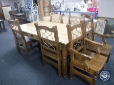 A pine farmhouse kitchen table fitted a drawer and six chairs