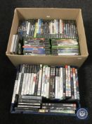 A box and a crate of assorted Xbox, Playstation 2 and Nintendo Wii games,
