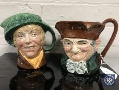 Two Royal Doulton character jugs : Old Charley, D 5420, height 15 cm, and 'Arriet, height 16 cm.
