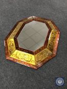 An octagonal all glass mirror