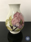 A Moorcroft vase, height 13.