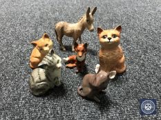 A collection of six Beswick figures; Donkey, fox,