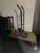 A flat bed trolley and a sack barrow