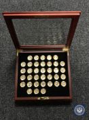 A cased Danbury Mint platinum and gold highlighted US Presidential coin collection (29)