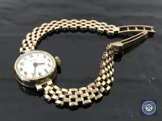 A 9ct gold Marvin wristwatch on 9ct gold bracelet 13.