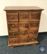 An Eastern mahogany twelve drawer chest