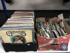 Two boxes of vinyl LP's and 45's;