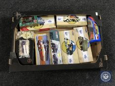 A collection of boxed Corgi and Siku die cast vehicles