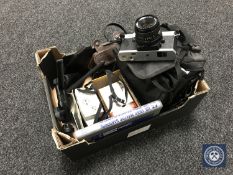 A box containing Mamiya camera bag with ZE camera and lens, Kodak camera,
