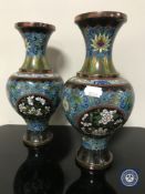 A pair of cloisonne floral vases on blue ground,