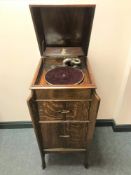 A Chas. Foulds Ltd oak cased gramophone.