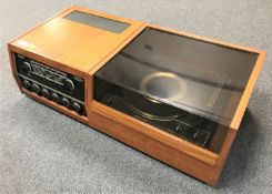 A Hacker teak cased radiogram, stereo audio radio GAR 1000,