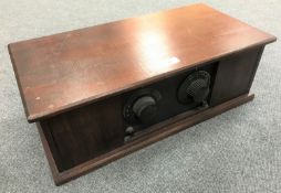 An early 20th century mahogany cased value radio.