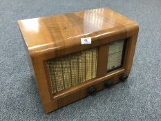 An Eveready valve radio in a walnut case.