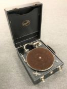 An early 20th century Edison Bell portable gramophone.