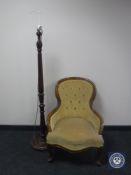 A lady's chair in gold button dralon and a mahogany standard lamp