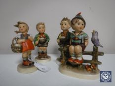 Four Hummel figures; Two boys with trumpets,