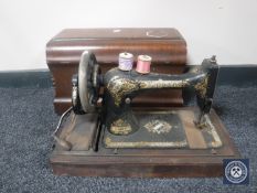 A mahogany cased Singer sewing machine